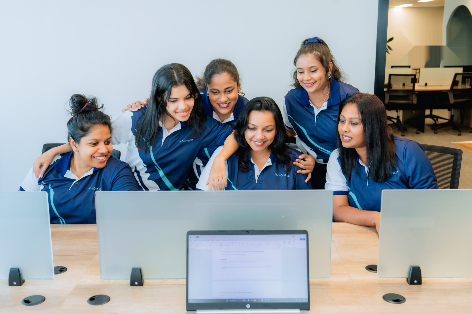 The Fusion Line team together in the office